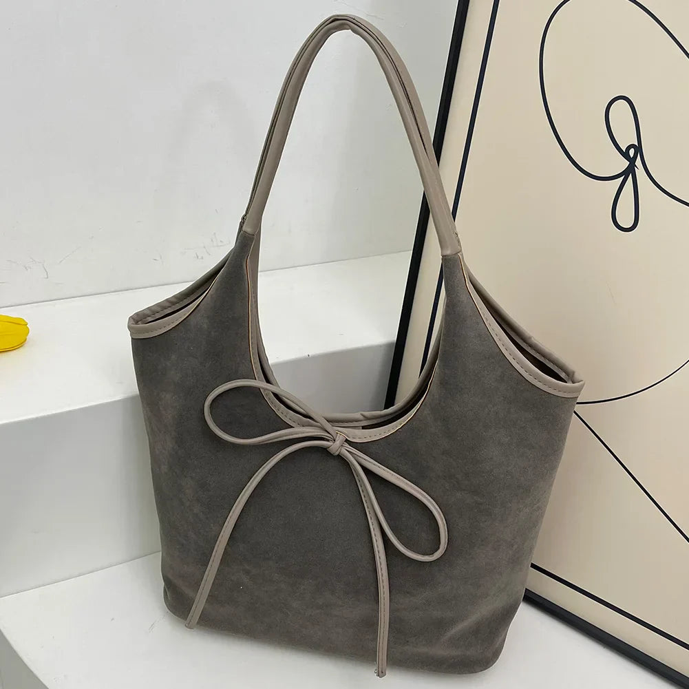 Daisy™ - Suede Bow Bag