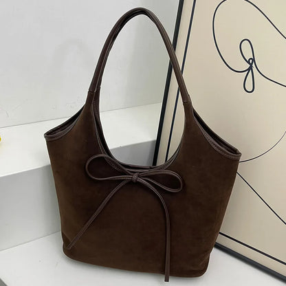 Daisy™ - Suede Bow Bag