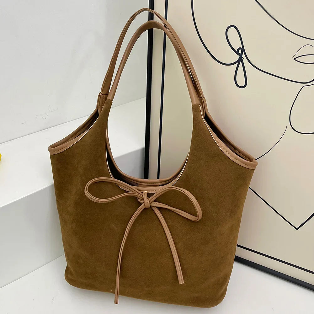 Daisy™ - Suede Bow Bag