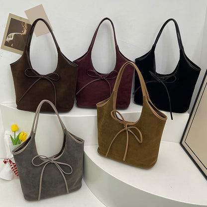 Daisy™ - Suede Bow Bag